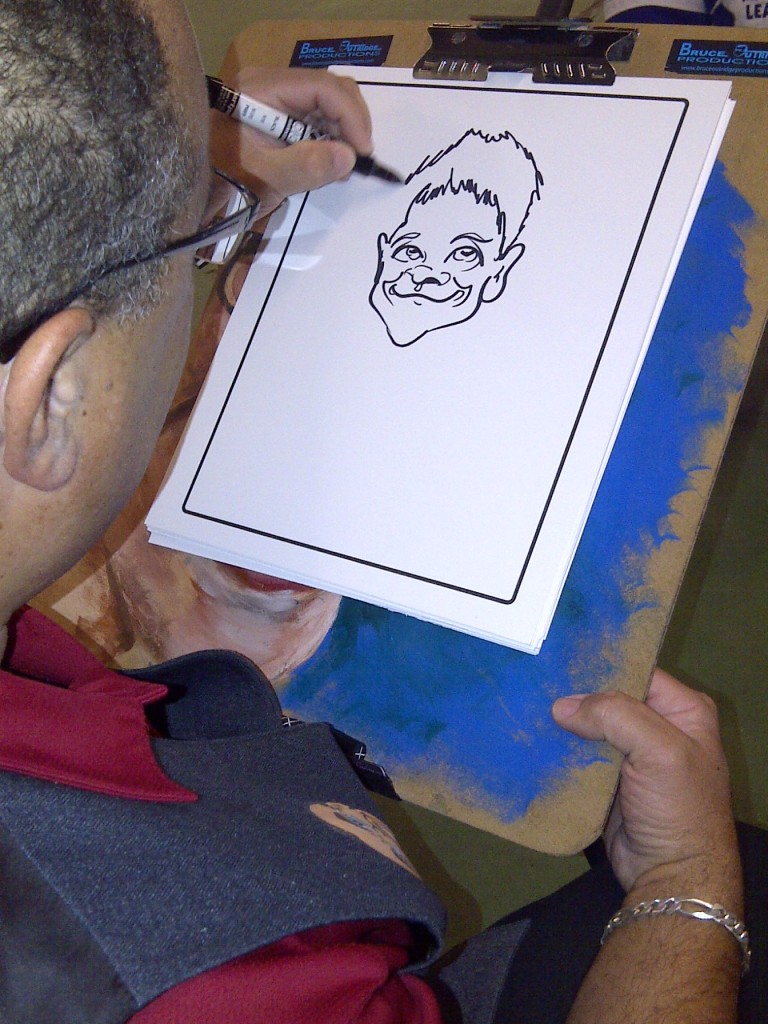 Bruce Drawing a Caricature